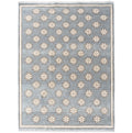 Gray Blue handwoven star rug with cream pattern and fringe on white background
